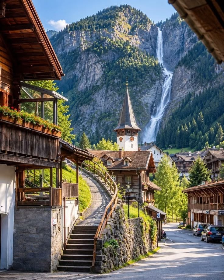 Staubbach Falls descending beside Lauterbrunnen village in the Swiss Alps