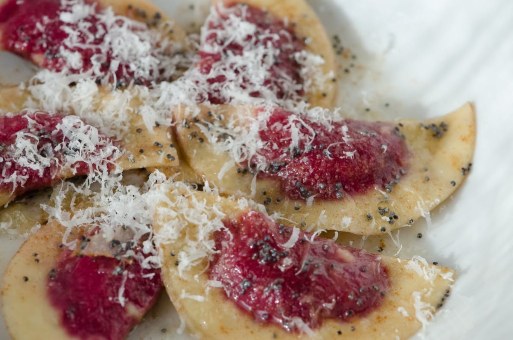 Casunziei, crescent-shaped beetroot-filled ravioli from Cortina d’Ampezzo, served on a plate